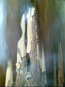 limescale on the wall of a furnace