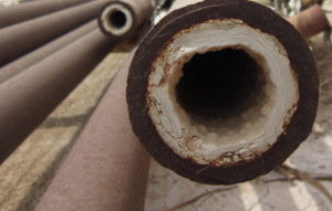 Hard water cause limescale in pipe